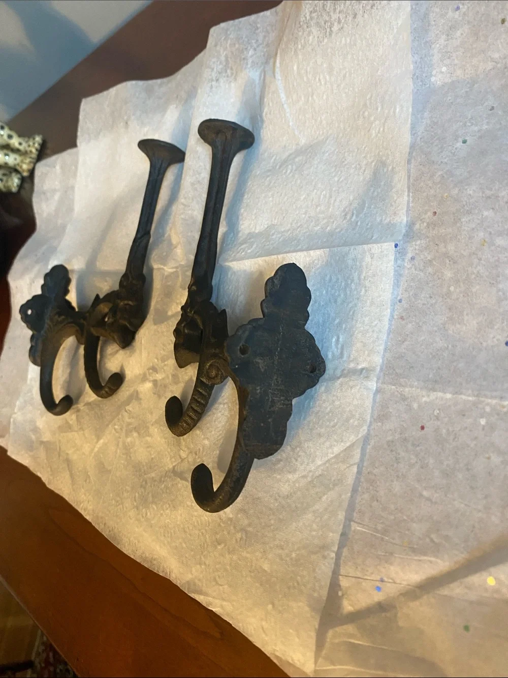 Vintage pair of cast Iron wall hooks. Lion’s head